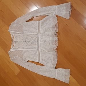 Free People bohemian style, lace, partial button down blouse. Size medium.